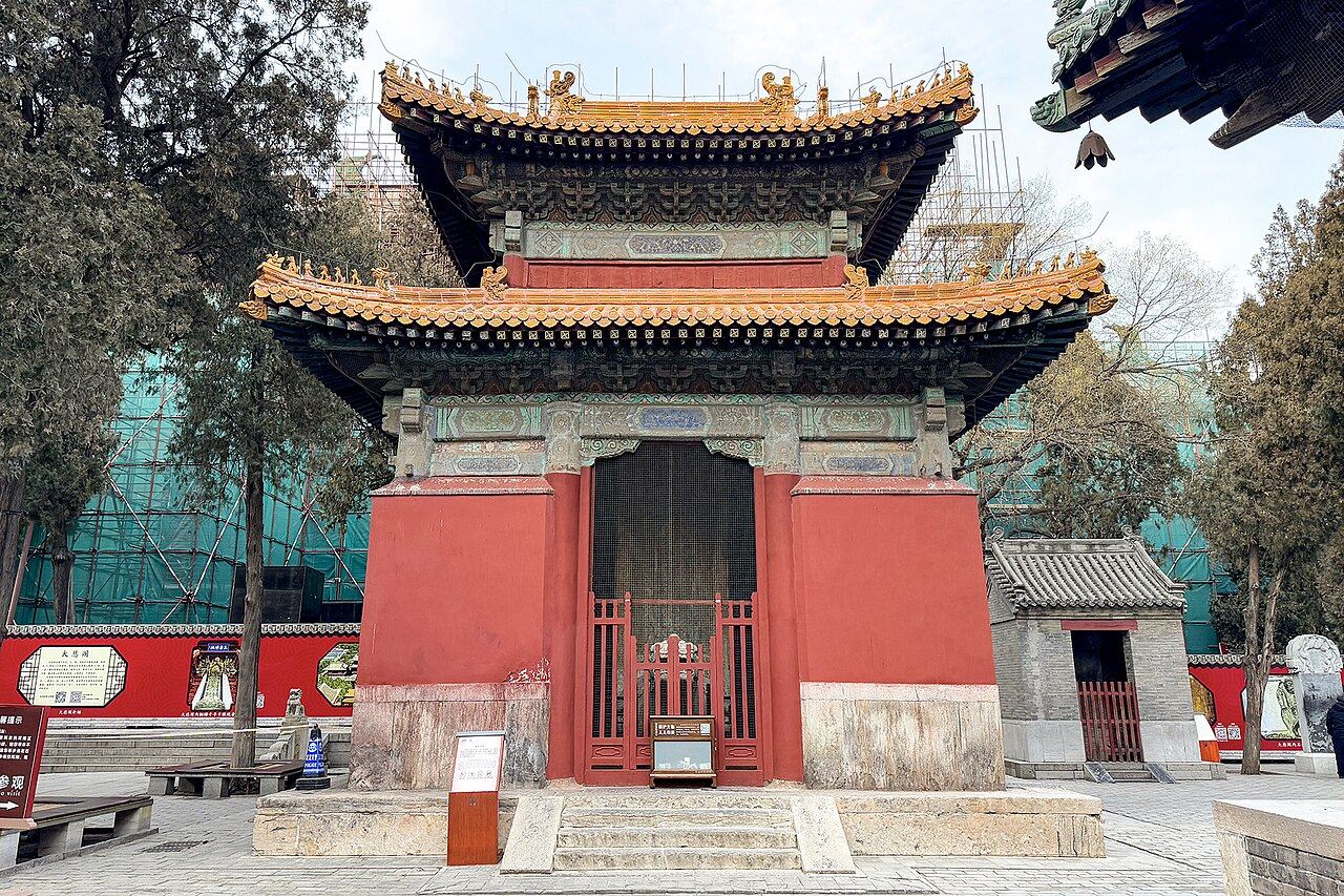 A red pavilion with golden-tiled roofs at Longxing Temple, Zhengding